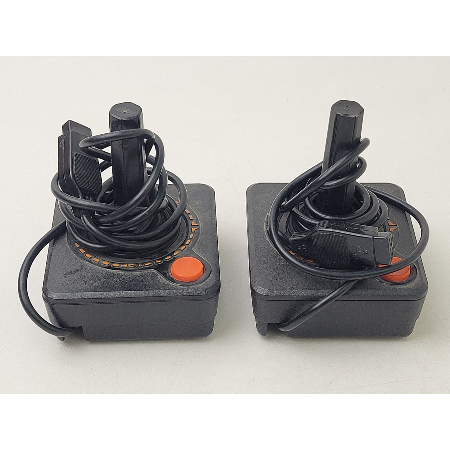 Vintage Atari 2600 Video Game Cartridges and Joystick Controllers