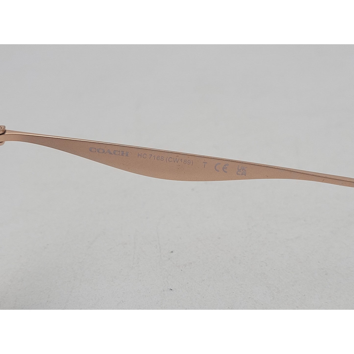 Coach HC7168 Shiny Rose Gold Geometric Sunglasses