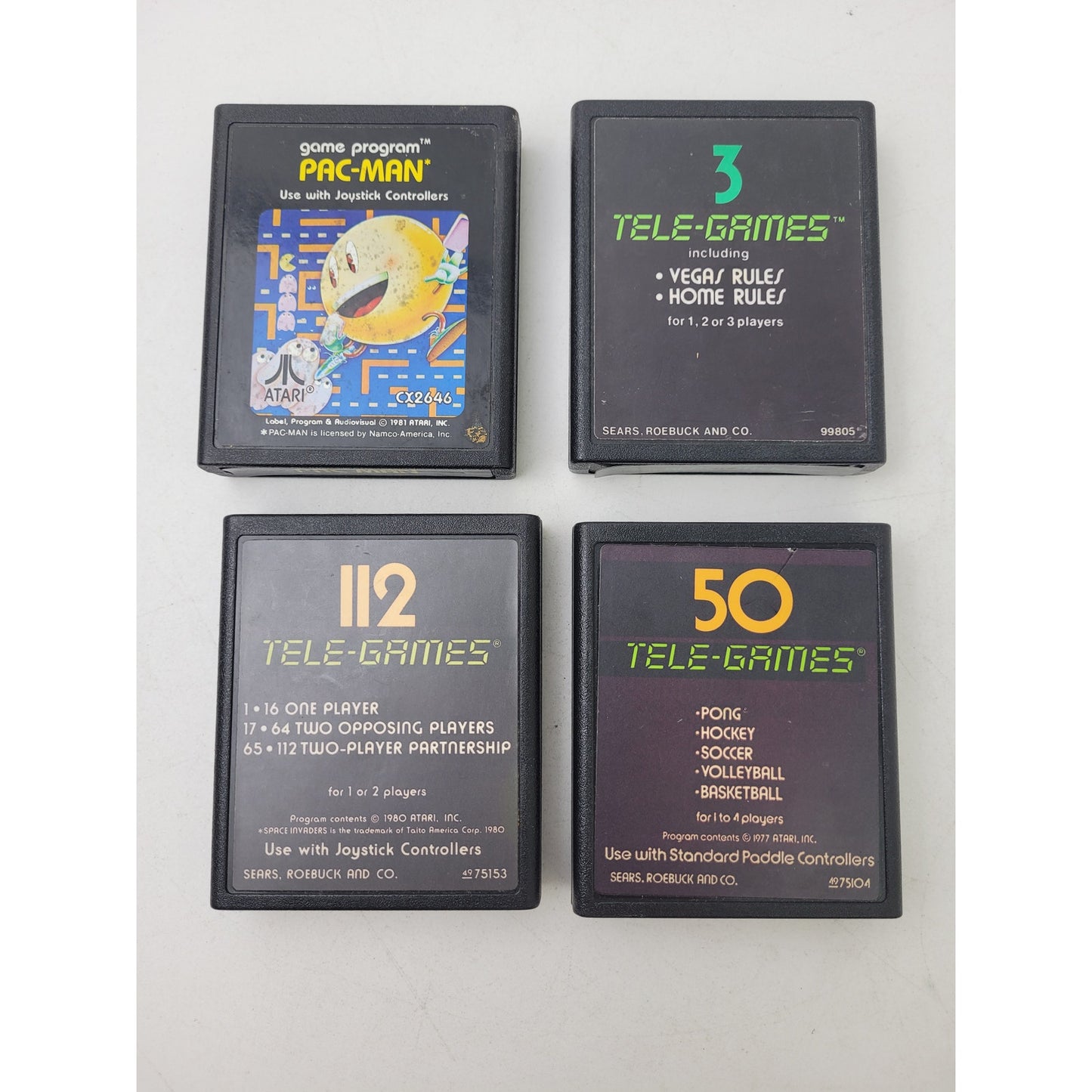 Vintage Atari 2600 Video Game Cartridges and Joystick Controllers