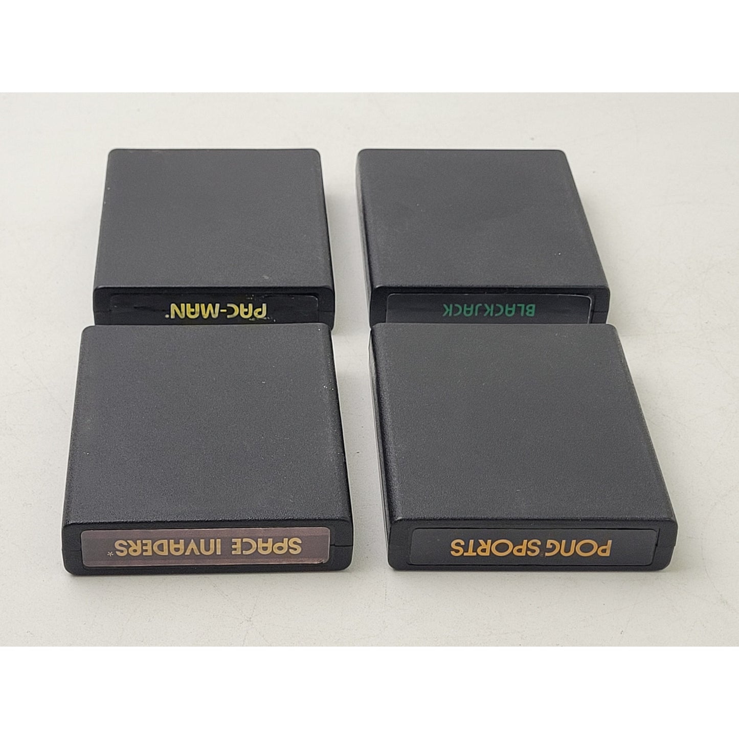 Vintage Atari 2600 Video Game Cartridges and Joystick Controllers
