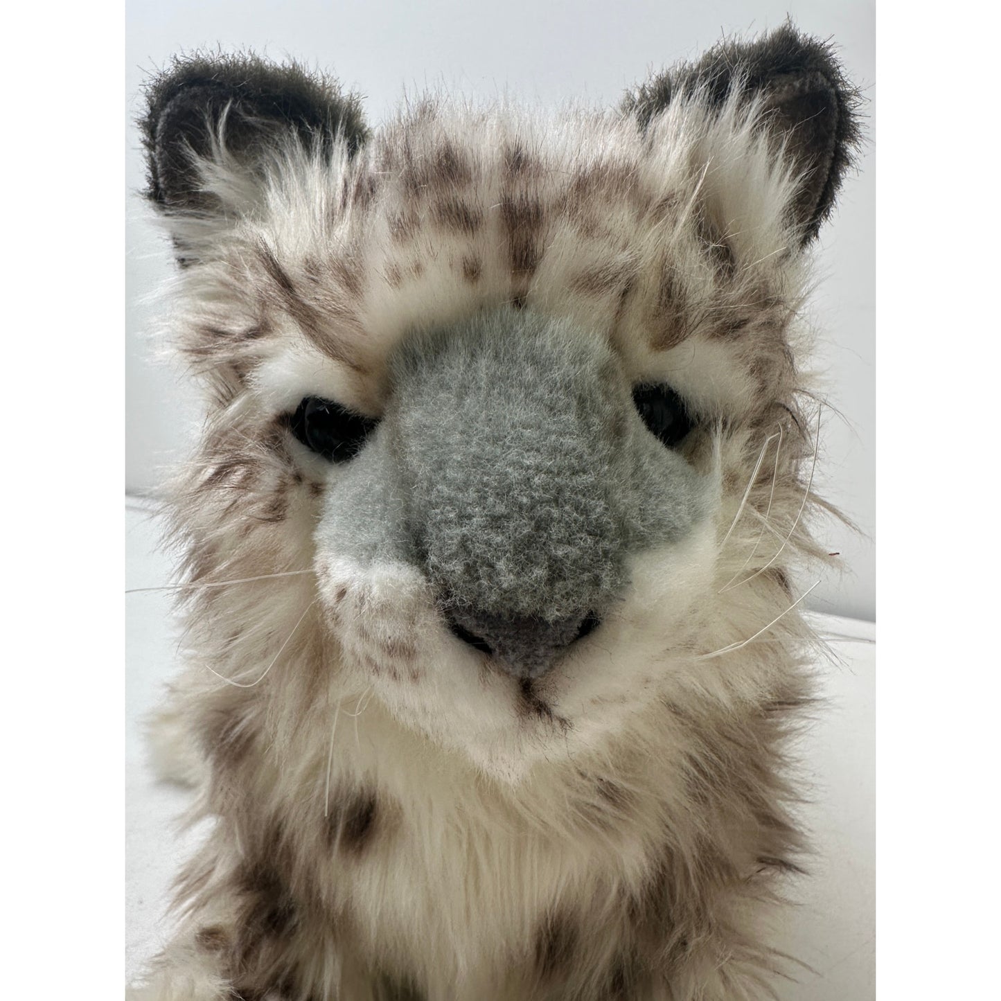 Hansa Portraits of Nature Lifelike Laying Snow Leopard Cub Plush 14"