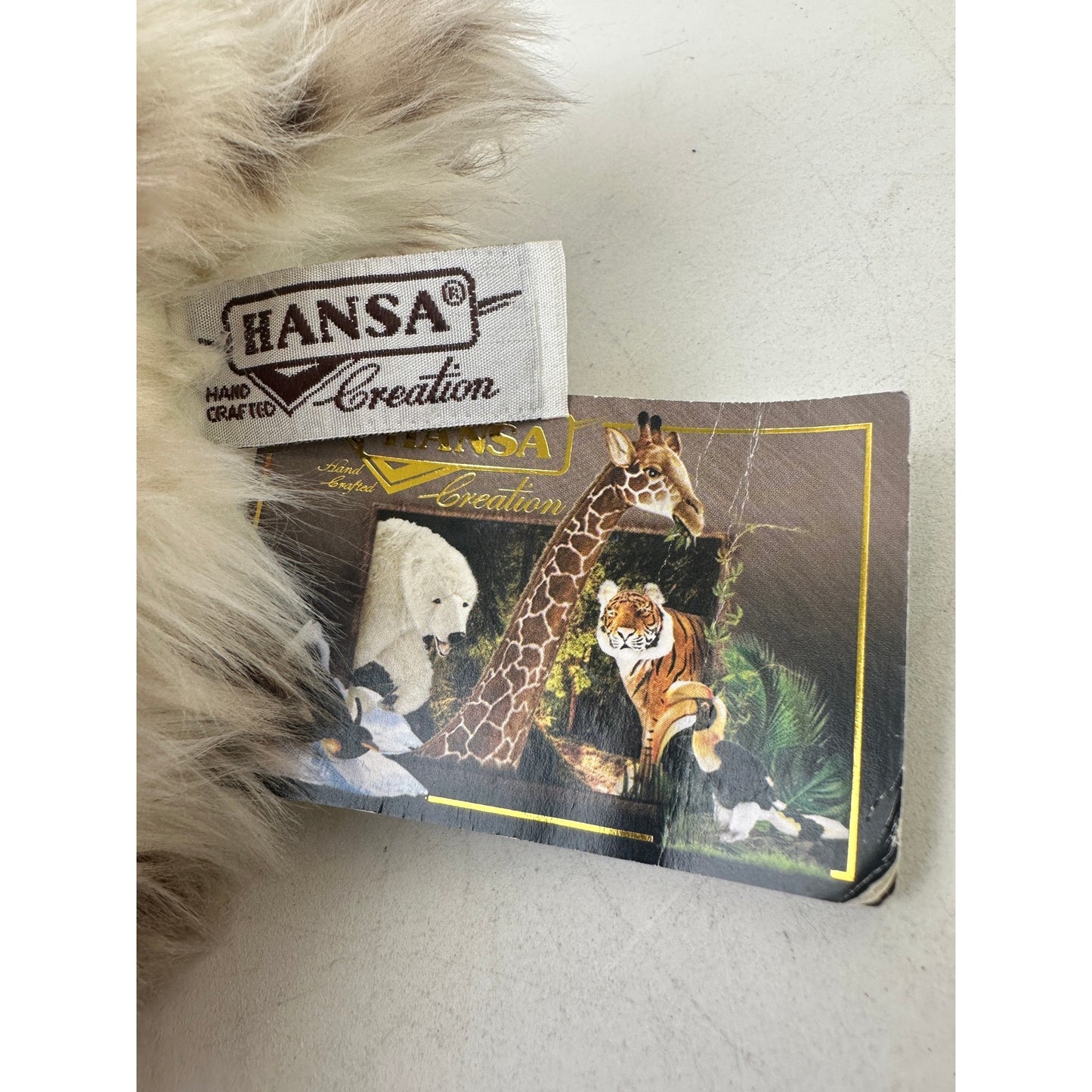 Hansa Portraits of Nature Lifelike Laying Snow Leopard Cub Plush 14"