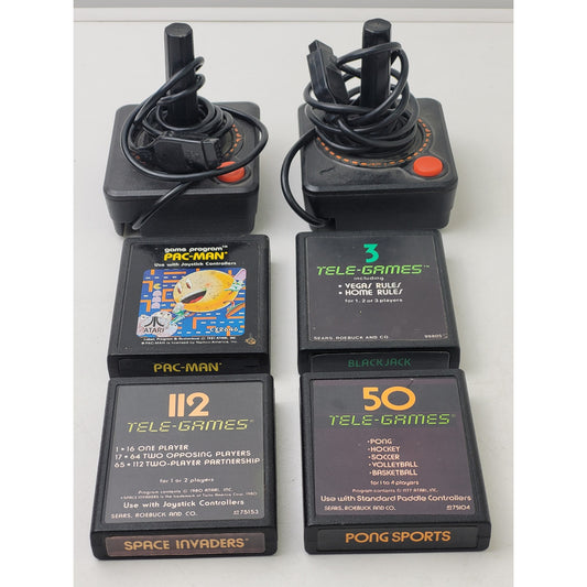 Vintage Atari 2600 Video Game Cartridges and Joystick Controllers