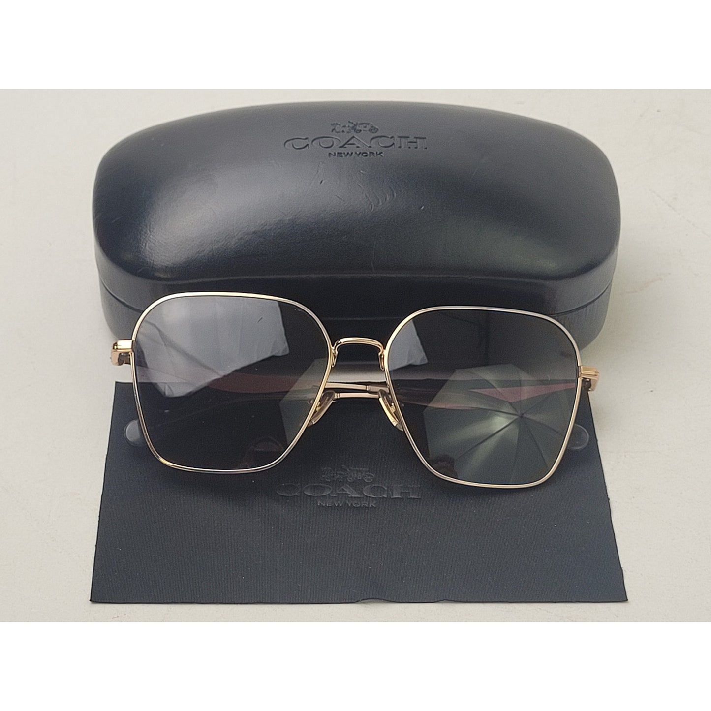Coach HC7168 Shiny Rose Gold Geometric Sunglasses