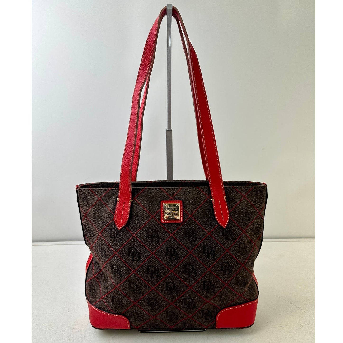 Dooney & Bourke Gretta Signature Brown / Red Monogram Coated Cotton Purse