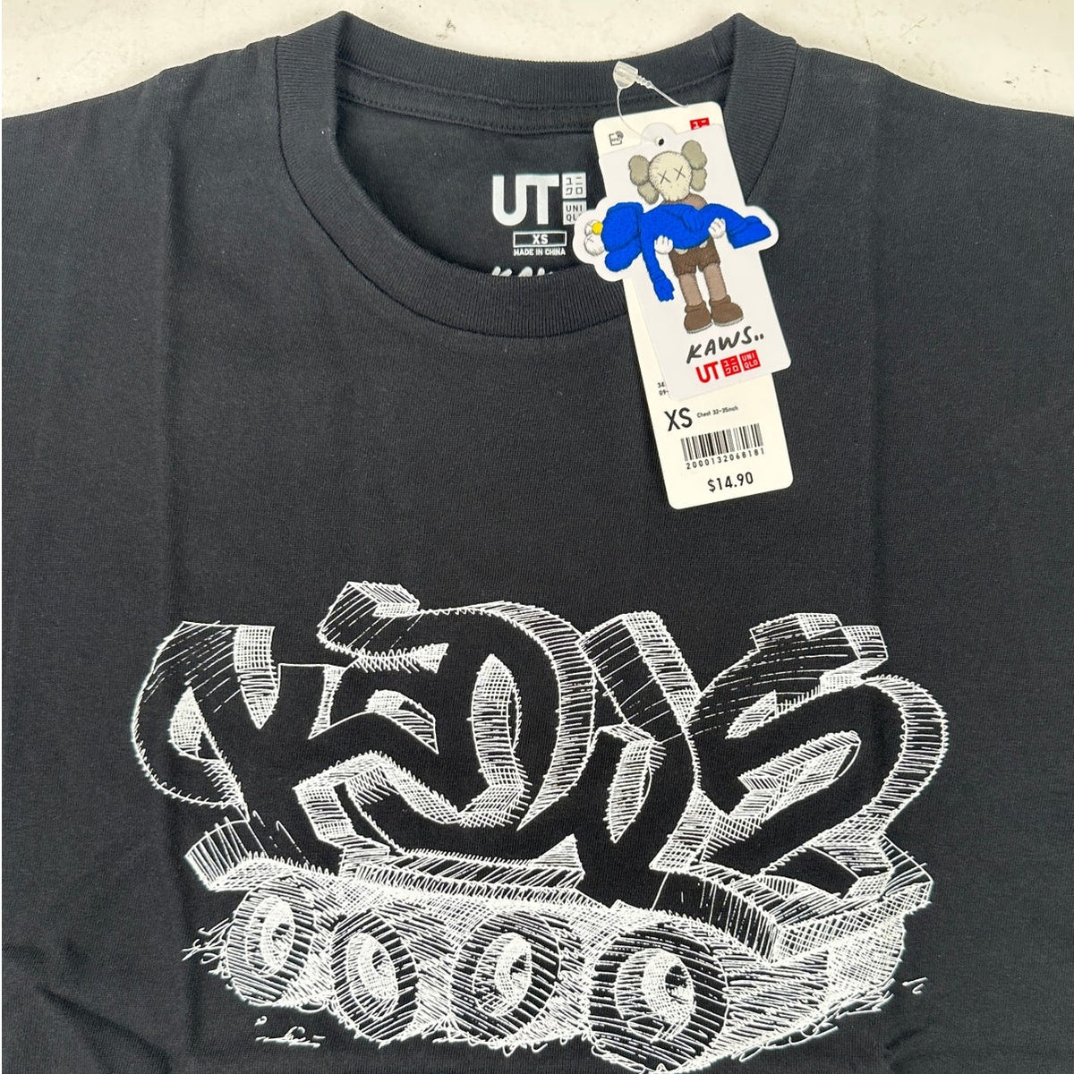 KAWS x Uniqlo UT Graffiti Wordmark Tank Tracks Black Tee Shirt Men's Sz XS | NWT