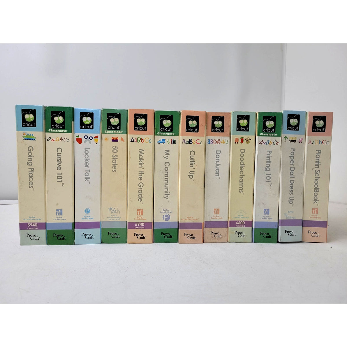 Cricut Cartridges in Storage Boxes Lot of 12