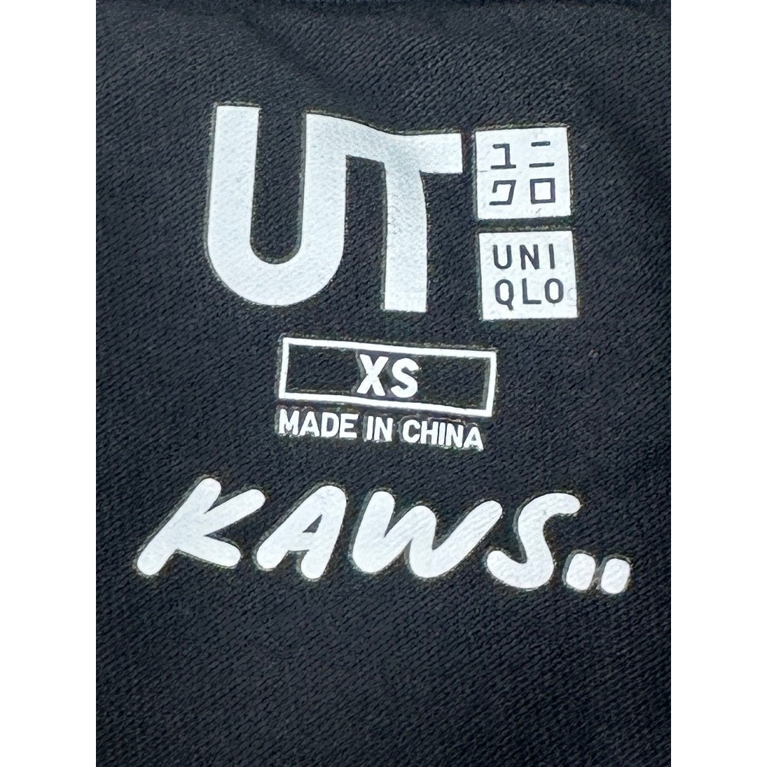 KAWS x Uniqlo UT Graffiti Wordmark Tank Tracks Black Tee Shirt Men's Sz XS | NWT