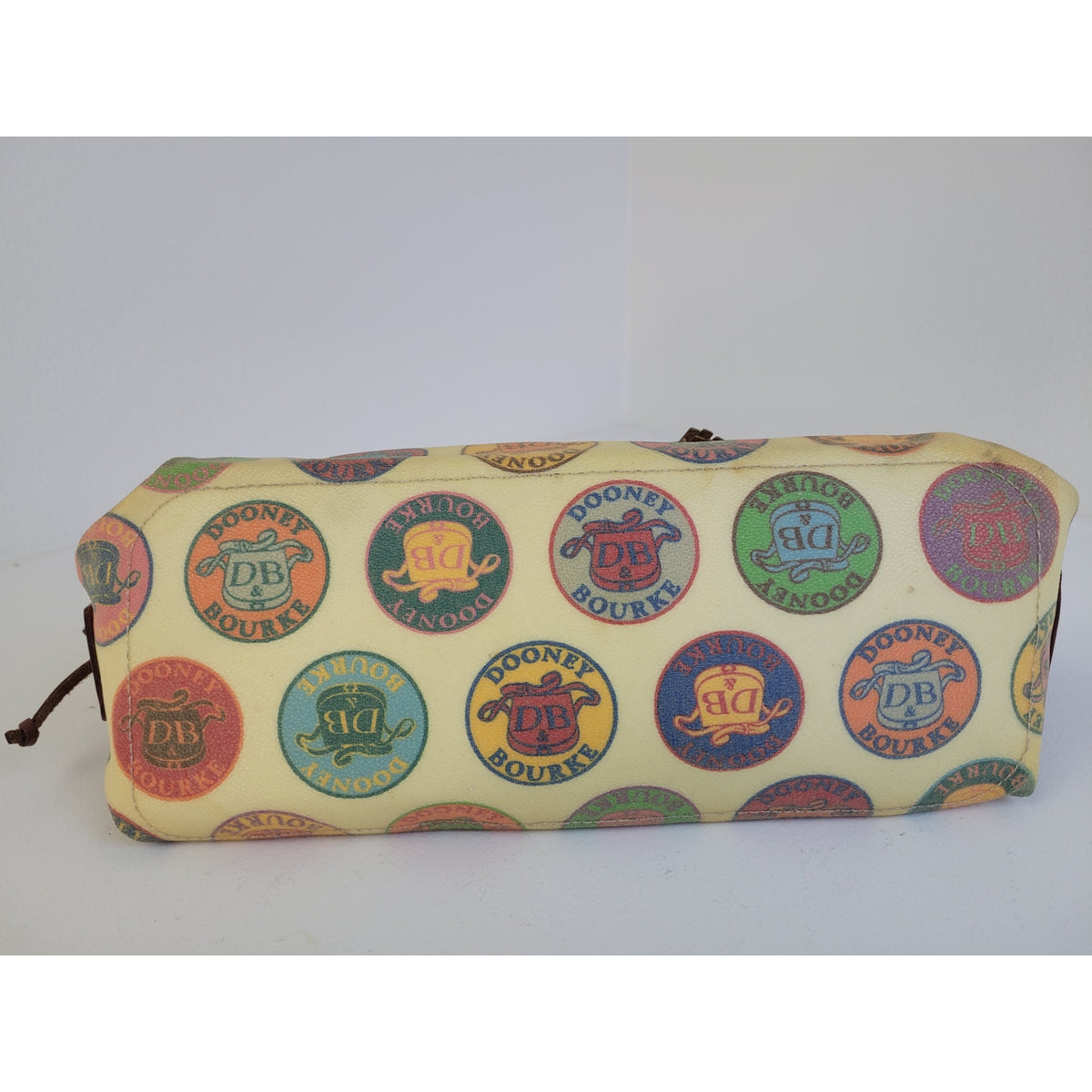 Vintage Y2K Dooney & Bourke Medallion Coated Canvas Tassel Tote/Satchel